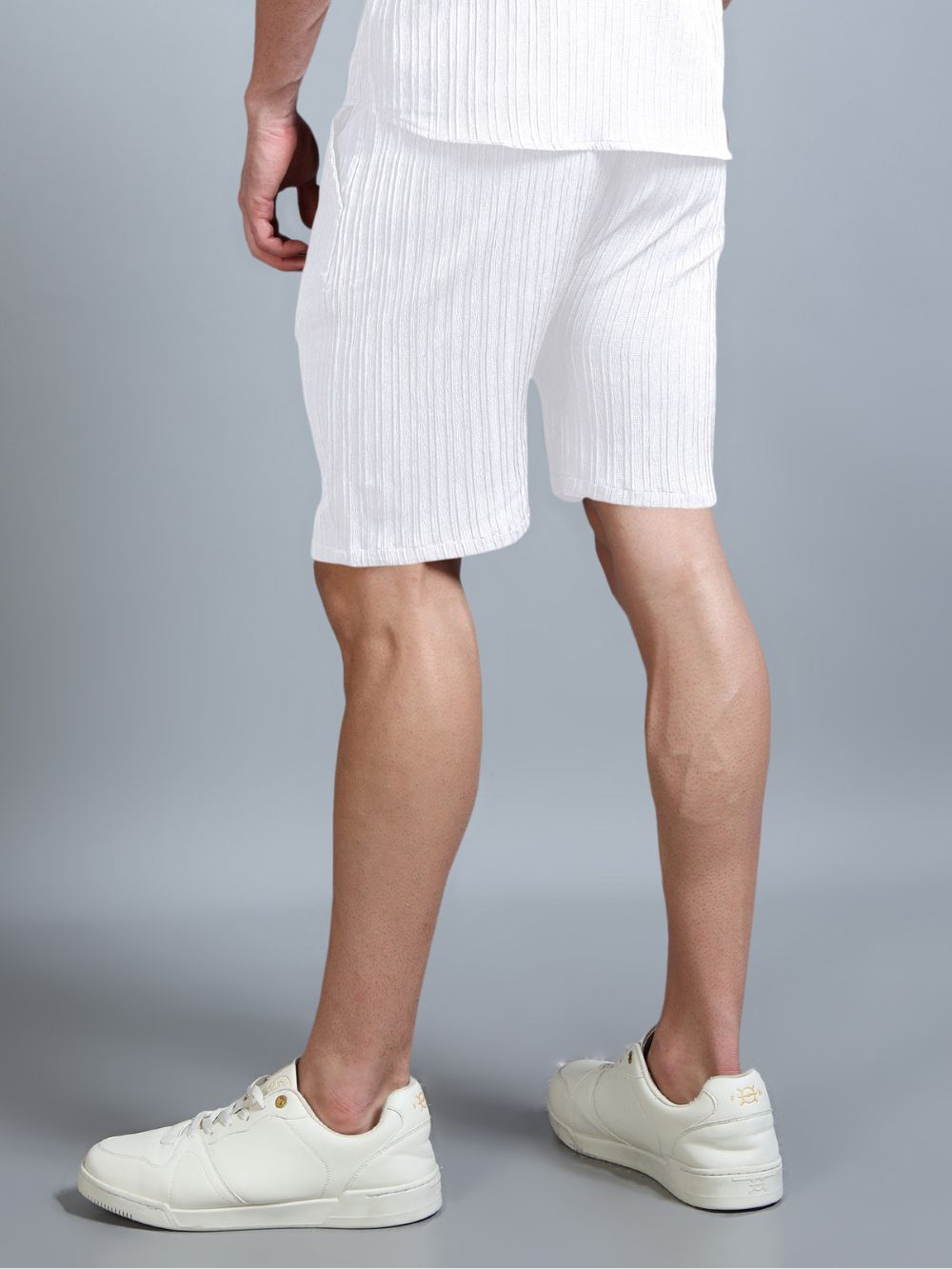 Whiteout Shorts back view with shirt and sneakers