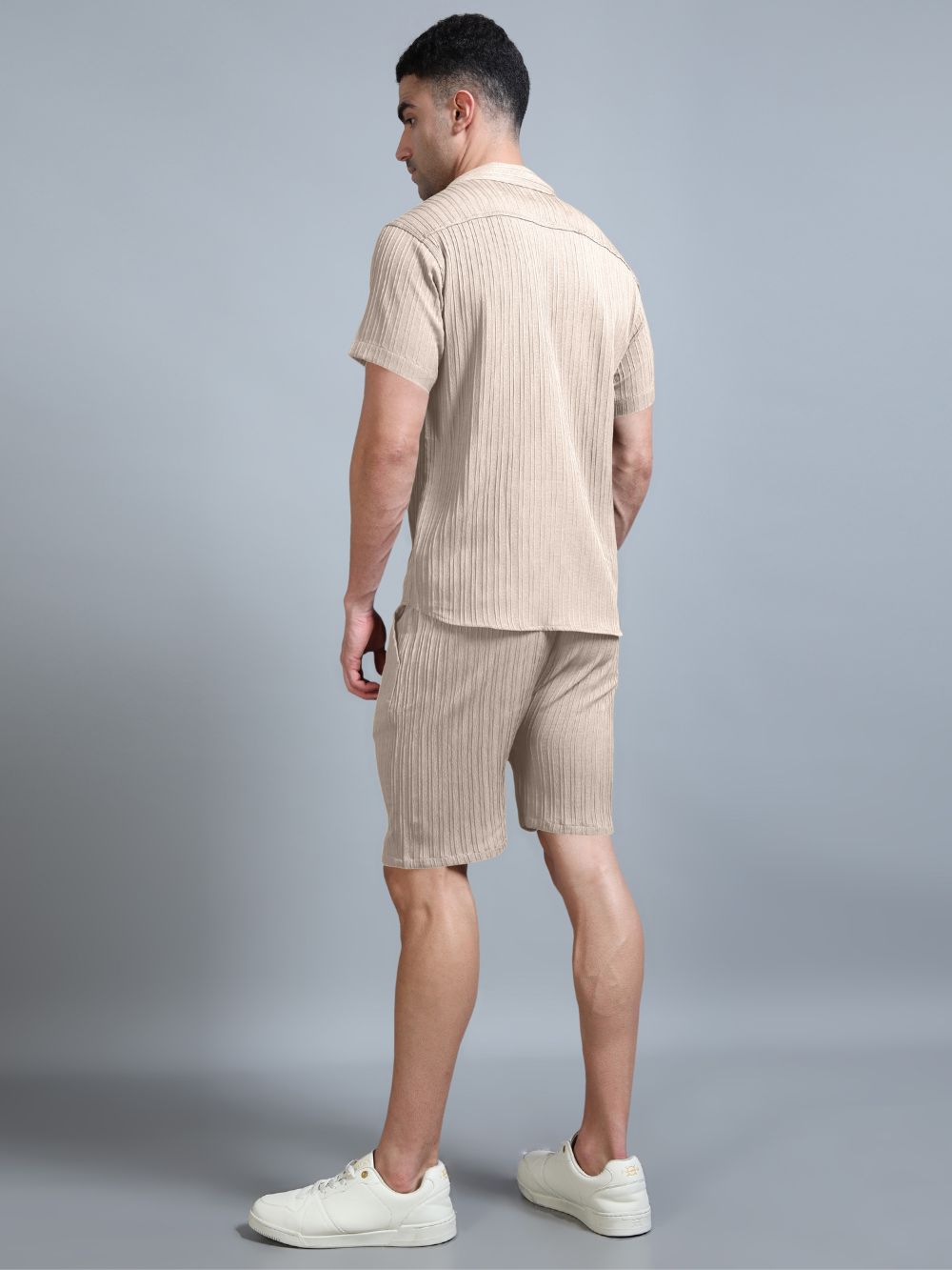 Back view beige co-ord set shirt and shorts