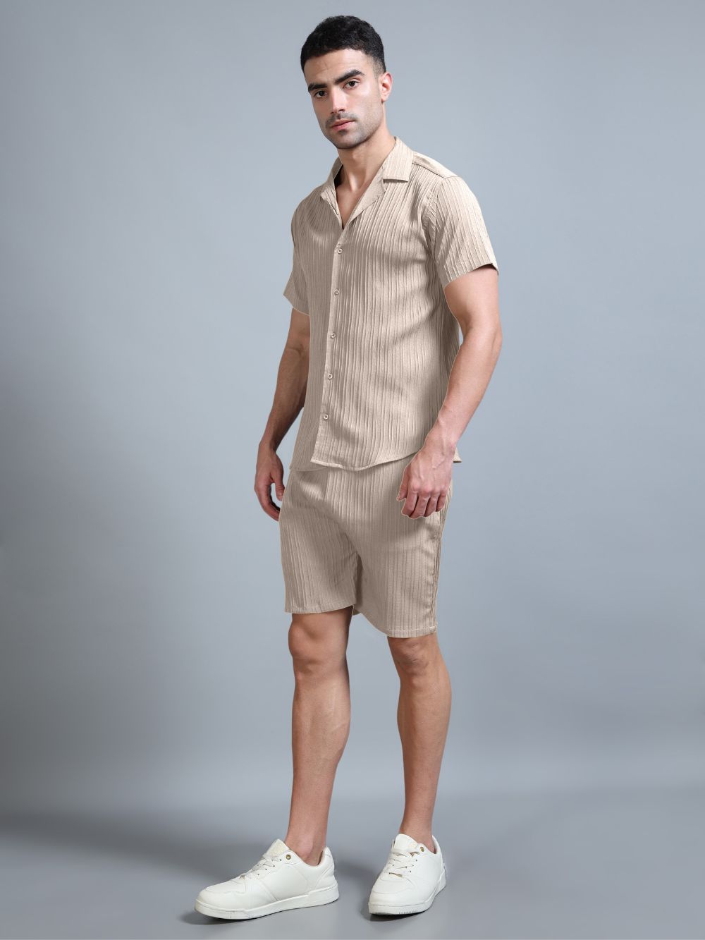 Side angle pose in beige co-ord set